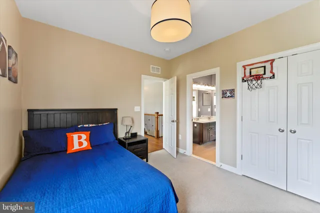 a living room with furniture window and wooden floor