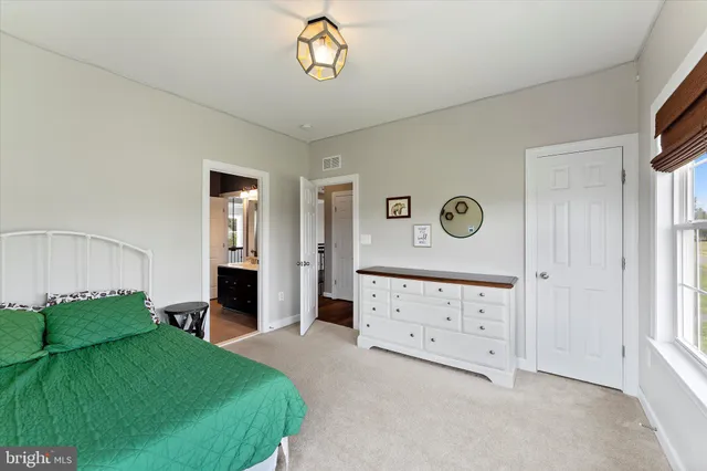a view of a balcony with furniture