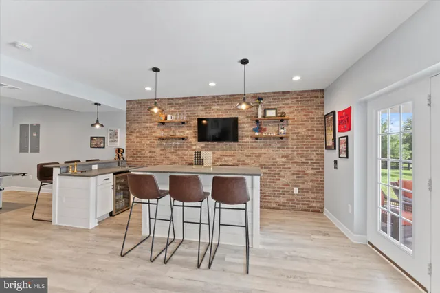 a view of a ocean view with a bench and lake view