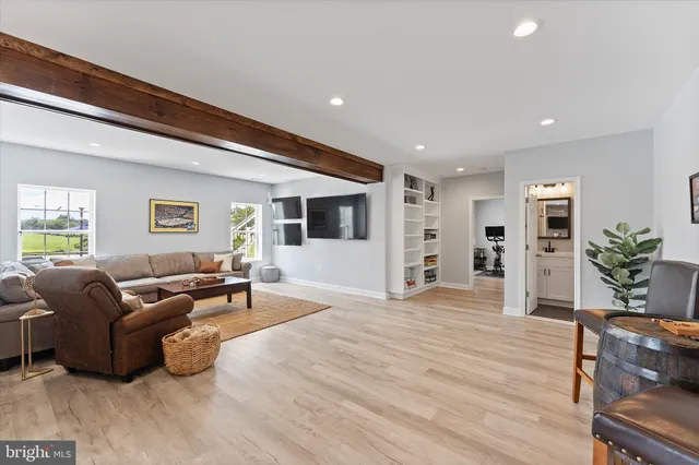 a view of a lake with houses in the background