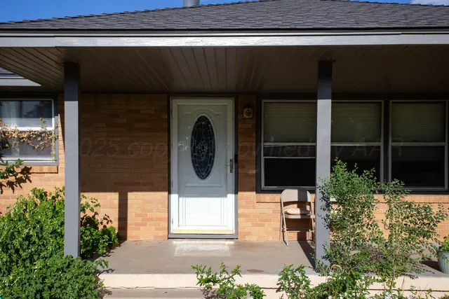 a front view of a house having yard
