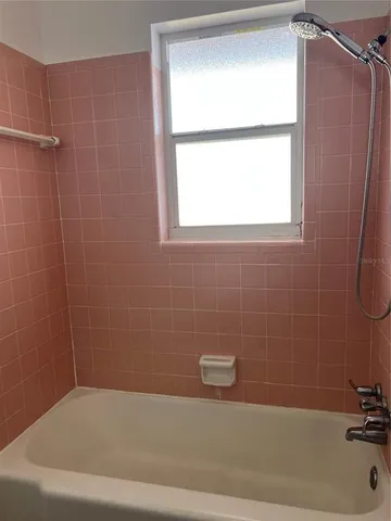 a bathroom with a bathtub