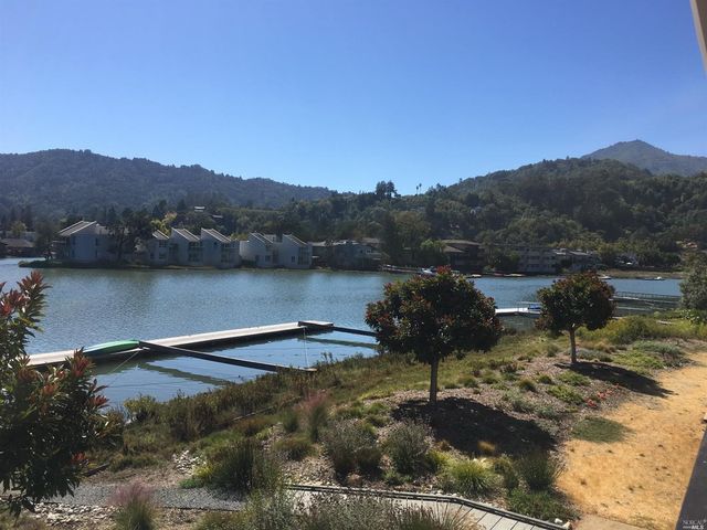a view of a lake in middle of the town