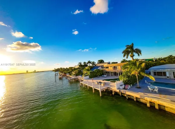 a view of a lake with a house
