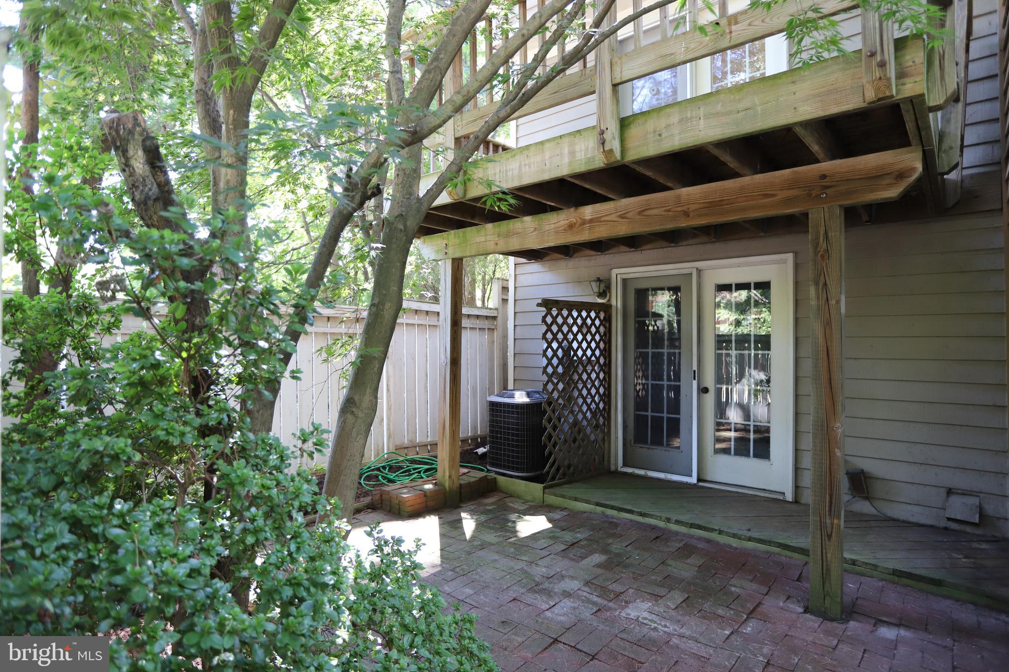 1915 Belmont Ridge Court Reston, VA 20191 - Photo 21 of 23 Lower Level has paved patio and back yard