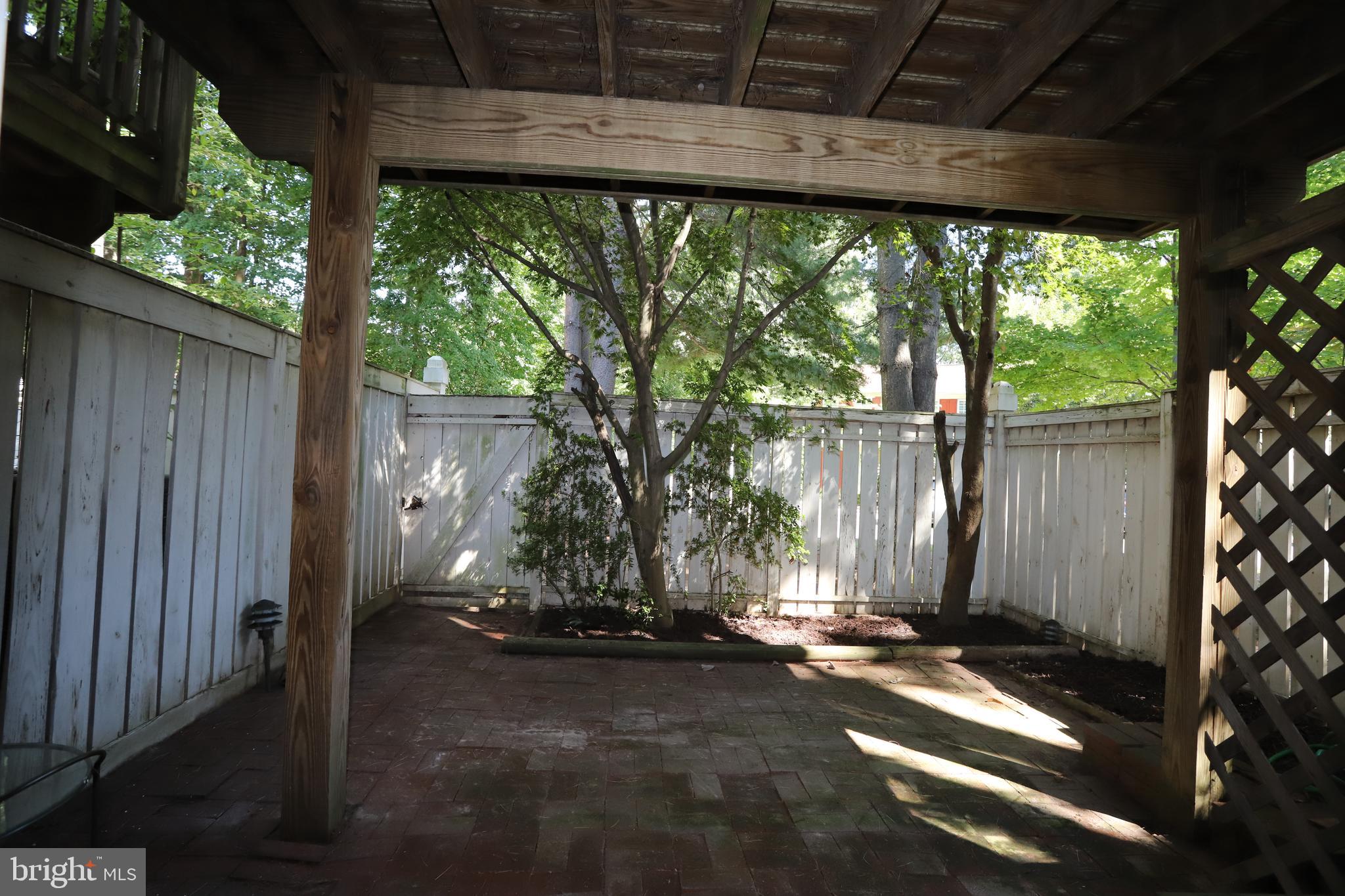 1915 Belmont Ridge Court Reston, VA 20191 - Photo 23 of 23 View of pation and back yard from Lower Level