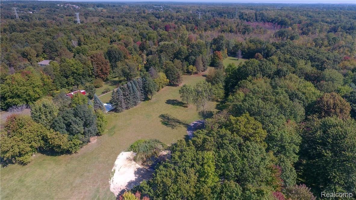 6108 Pine Knob Road Clarkston, MI 48348 - Photo 2 of 48 Up North Feel but City Convenience