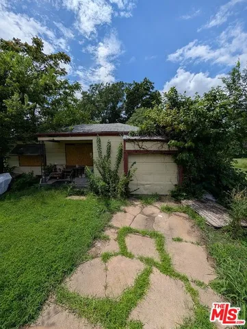 a view of backyard with green space