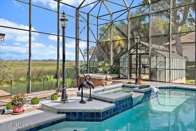 a living room with furniture cabinets and a flat screen tv