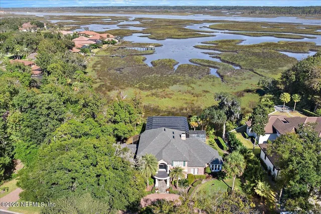 a living room with furniture fireplace and rug
