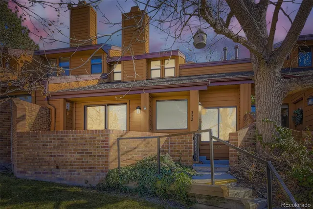 front view of a house with a small yard