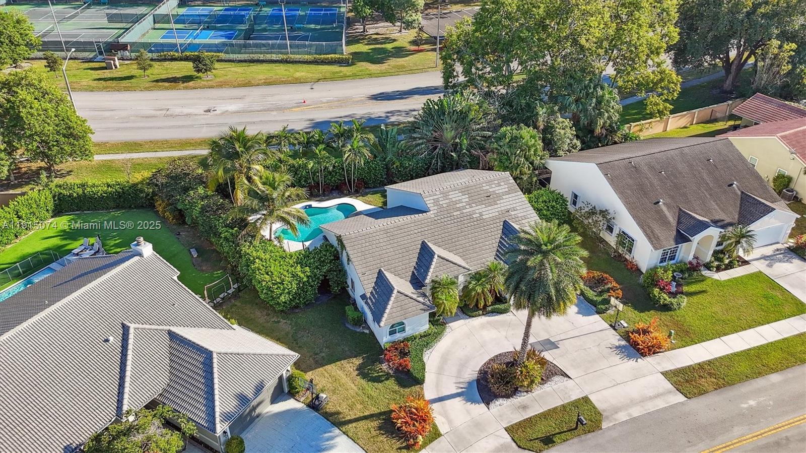 1510 Southwest 96th Terrace Davie, FL 33324 - Photo 28 of 28 an aerial view of a house with a yard basket ball court and outdoor seating