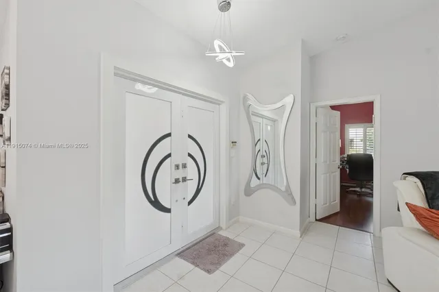 a view of a storage and utility room with closet