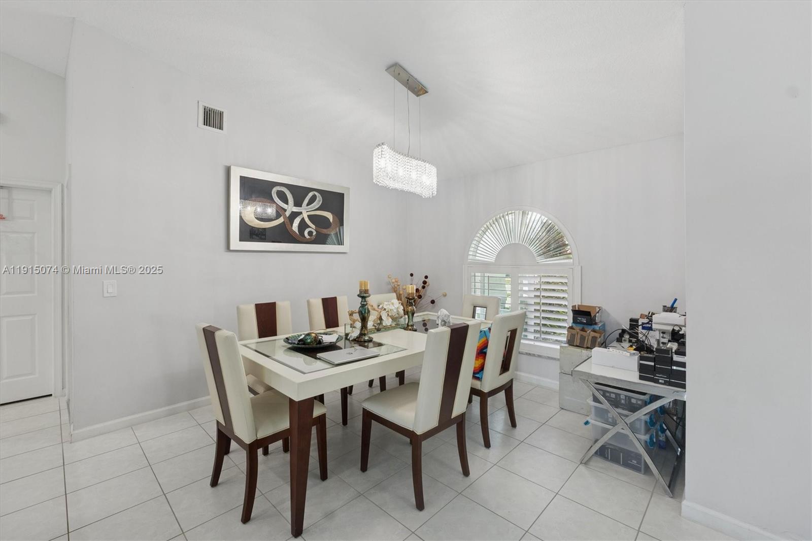 1510 Southwest 96th Terrace Davie, FL 33324 - Photo 9 of 28 a dining room with furniture and window
