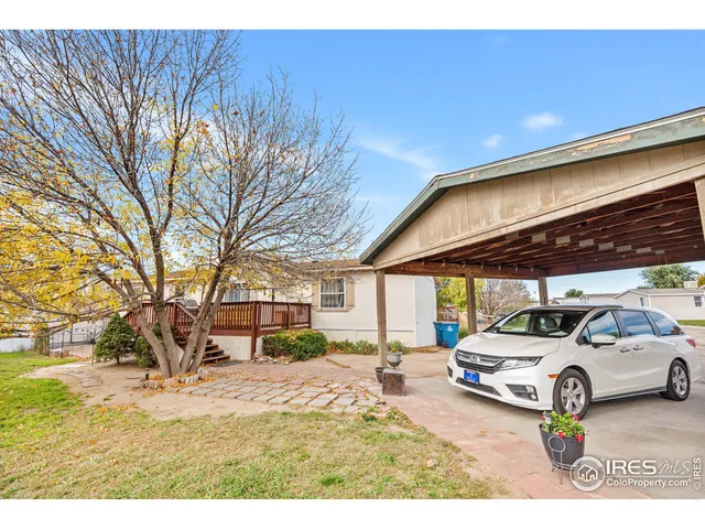 a view of a cars park in front of house
