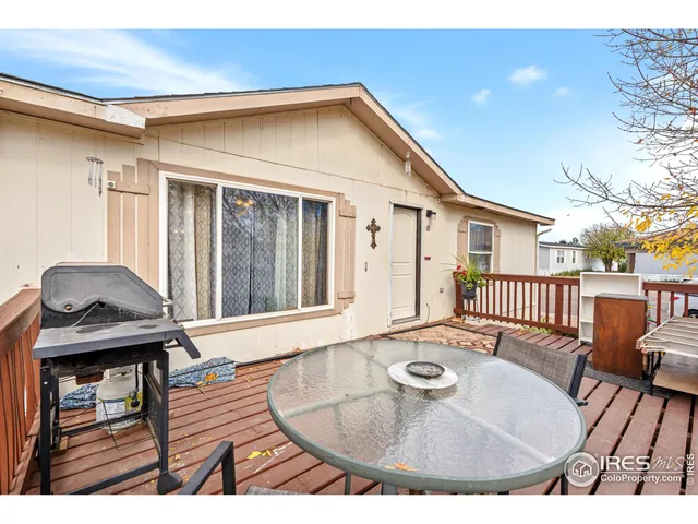 a view of a livingroom with furniture and wooden floor