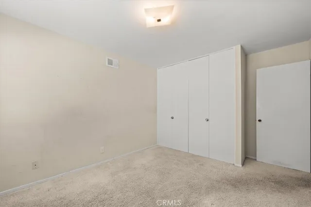 a bathroom with a granite countertop sink and a bathtub
