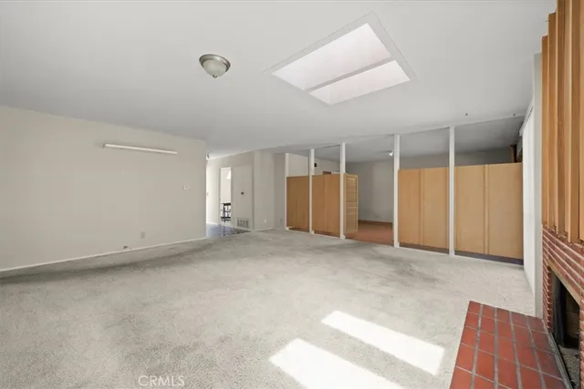 an empty room with a natural light