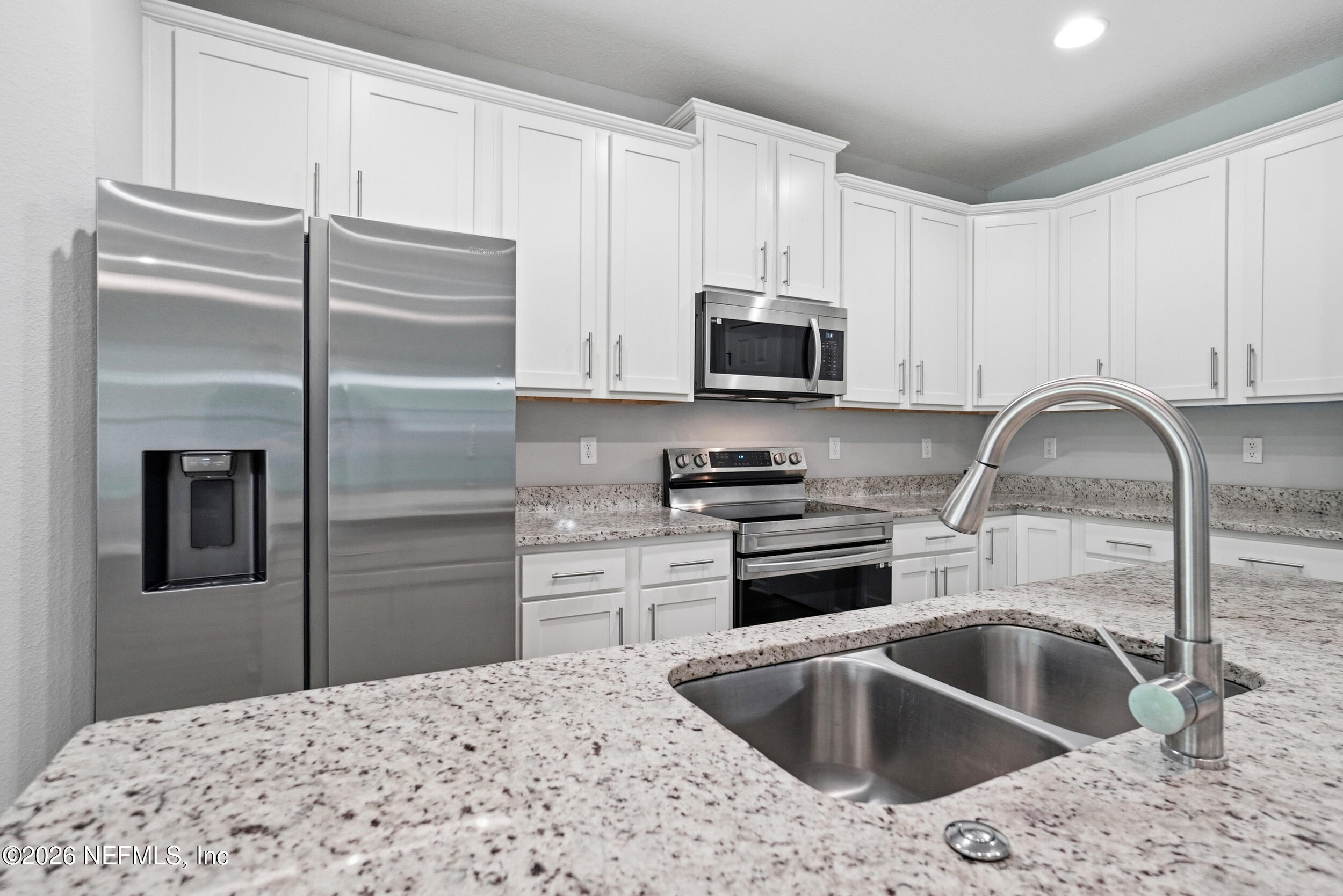9035 Marlee Road Jacksonville, FL 32222 - Photo 12 of 34 White cabinets