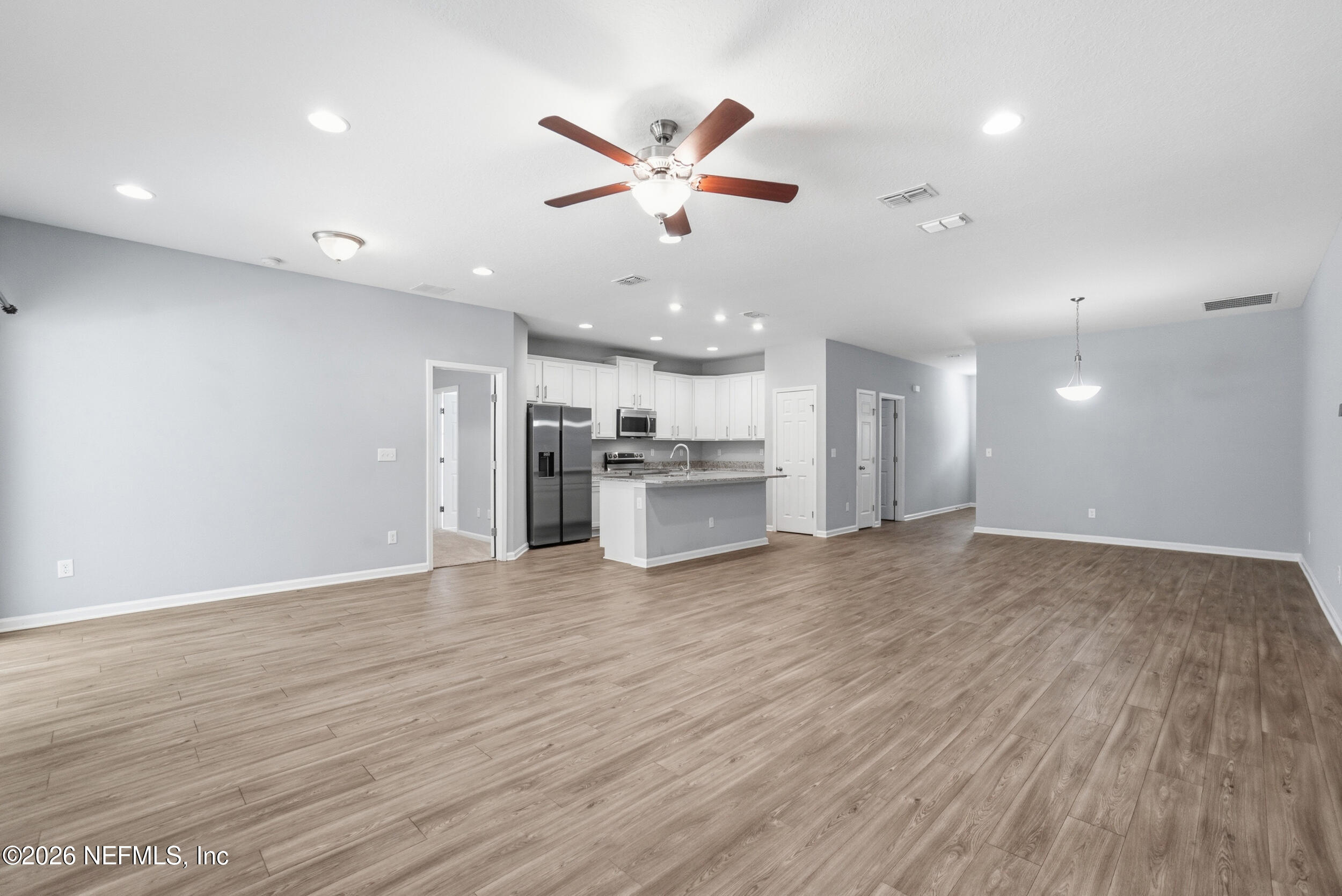 9035 Marlee Road Jacksonville, FL 32222 - Photo 7 of 34 Luxury Vinyl Plank flooring