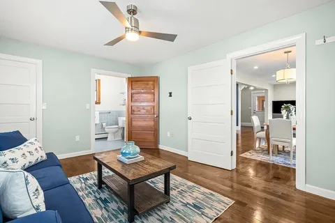 a living room with furniture and a table