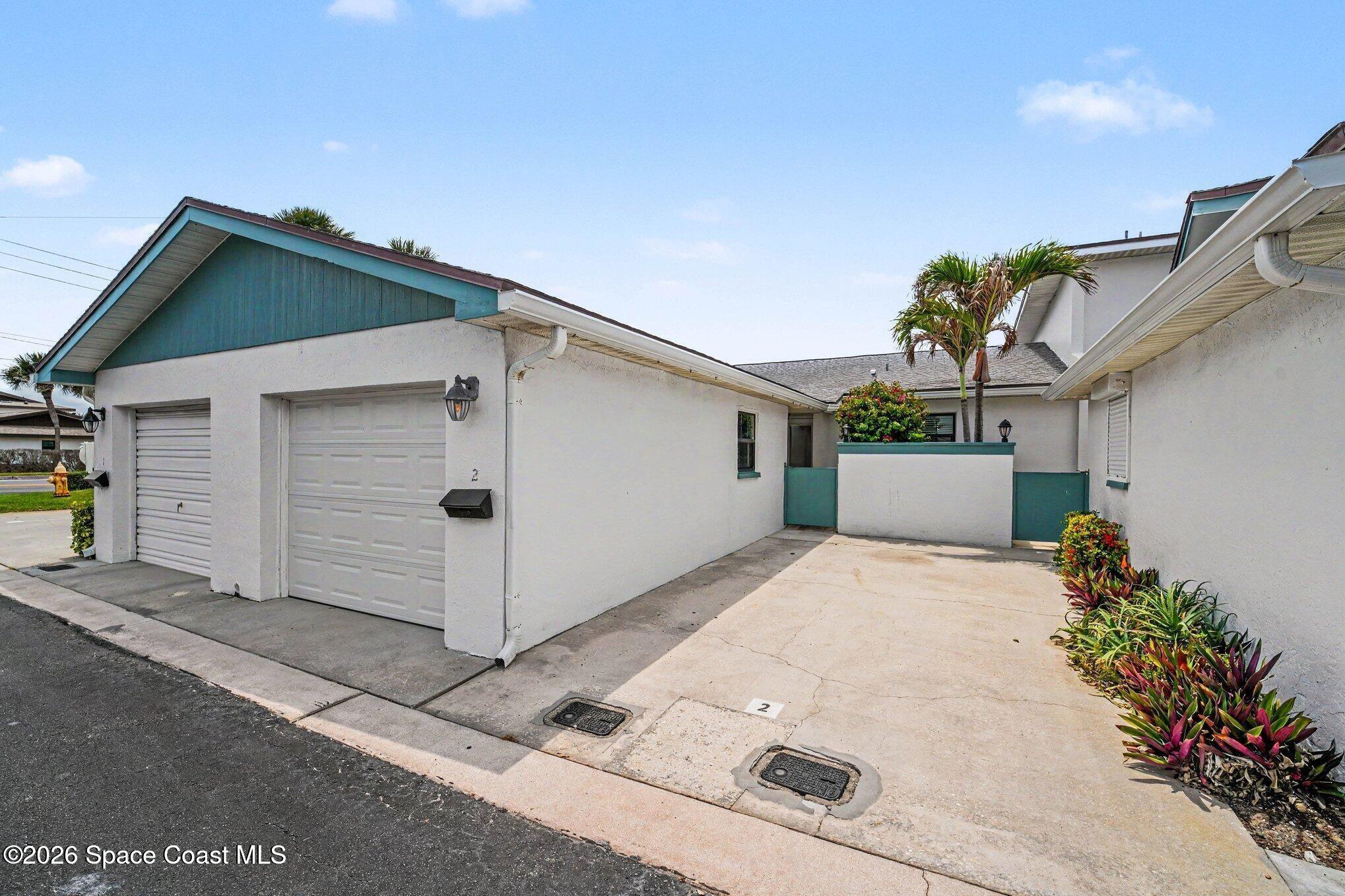 290 Paradise Boulevard, Unit 2 Indialantic, FL 32903 - Photo 18 of 20 Entrance & Garage