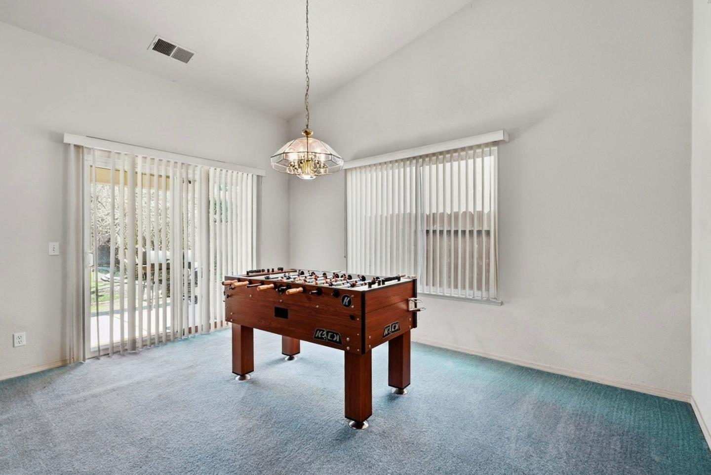 3882 Pintail Court Merced, CA 95340 - Photo 13 of 21 a room with furniture and window