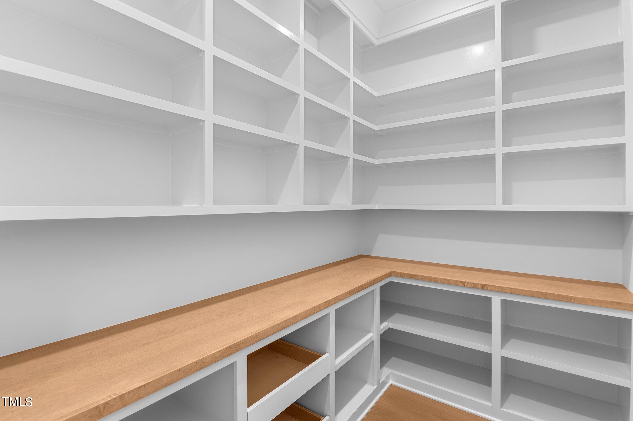 2639 Marchmont Street Raleigh, NC 27608 - Photo 15 of 41 a storage room with wooden floor