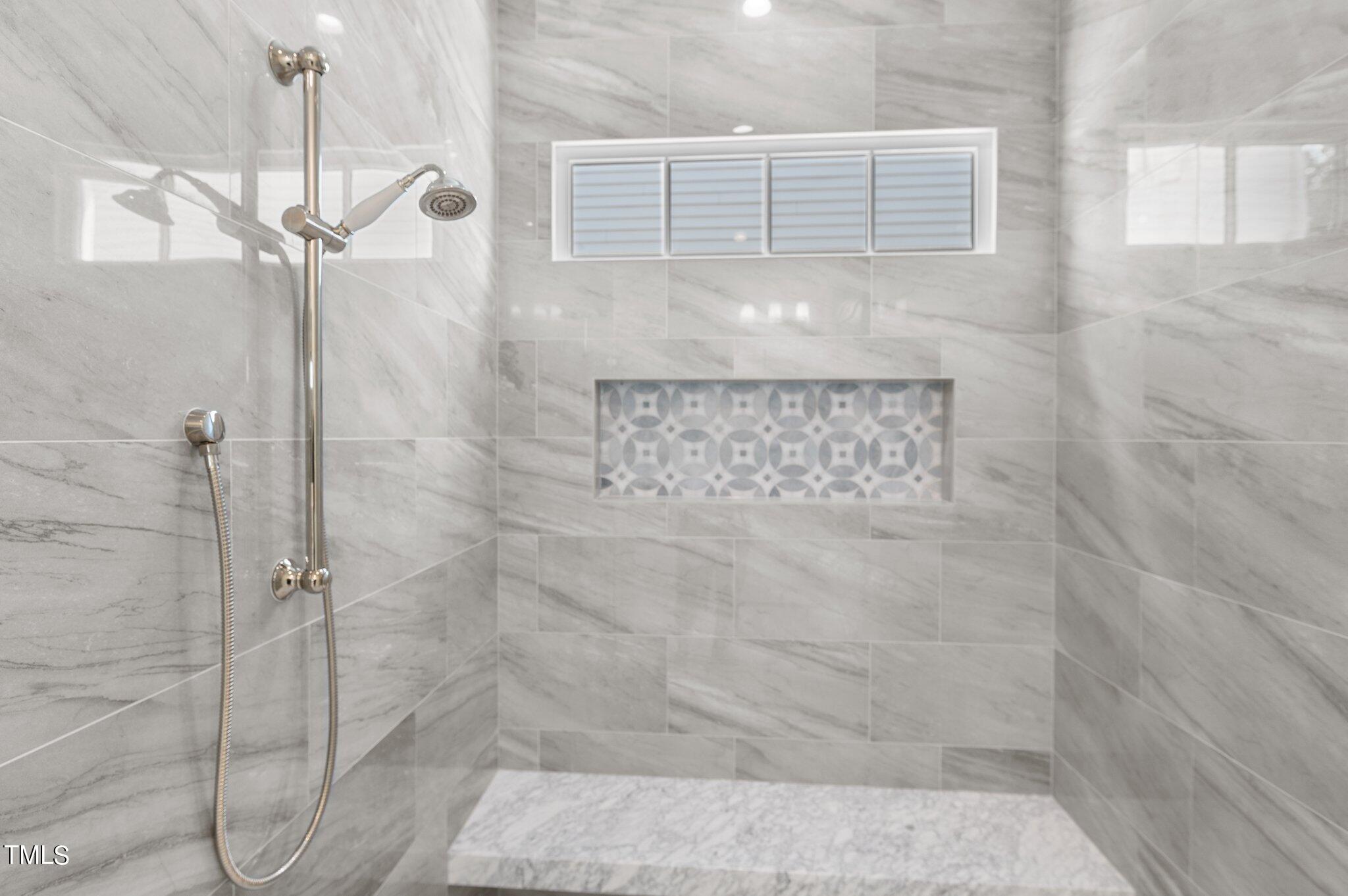 2639 Marchmont Street Raleigh, NC 27608 - Photo 18 of 41 a bathroom with a shower