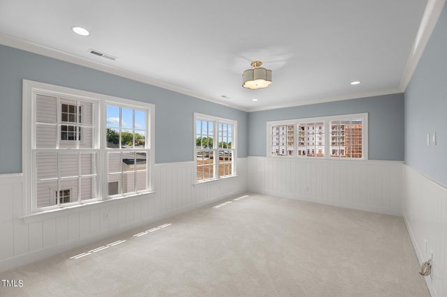 a view of an empty room with a empty shelves