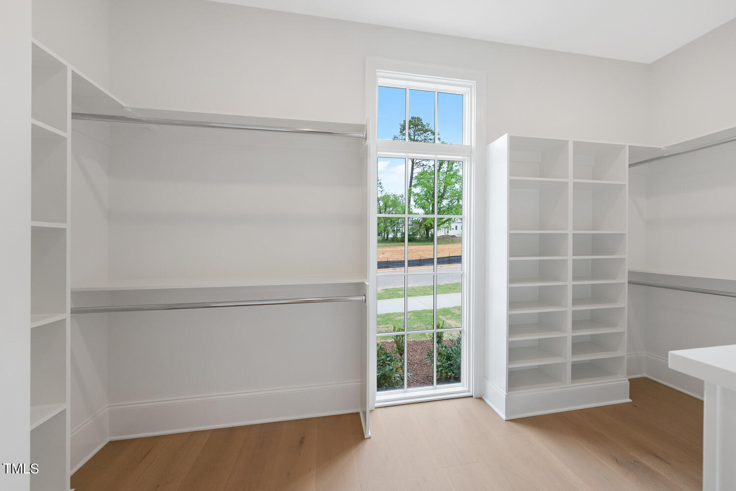 2639 Marchmont Street Raleigh, NC 27608 - Photo 25 of 41 a view of an empty room with a empty shelves
