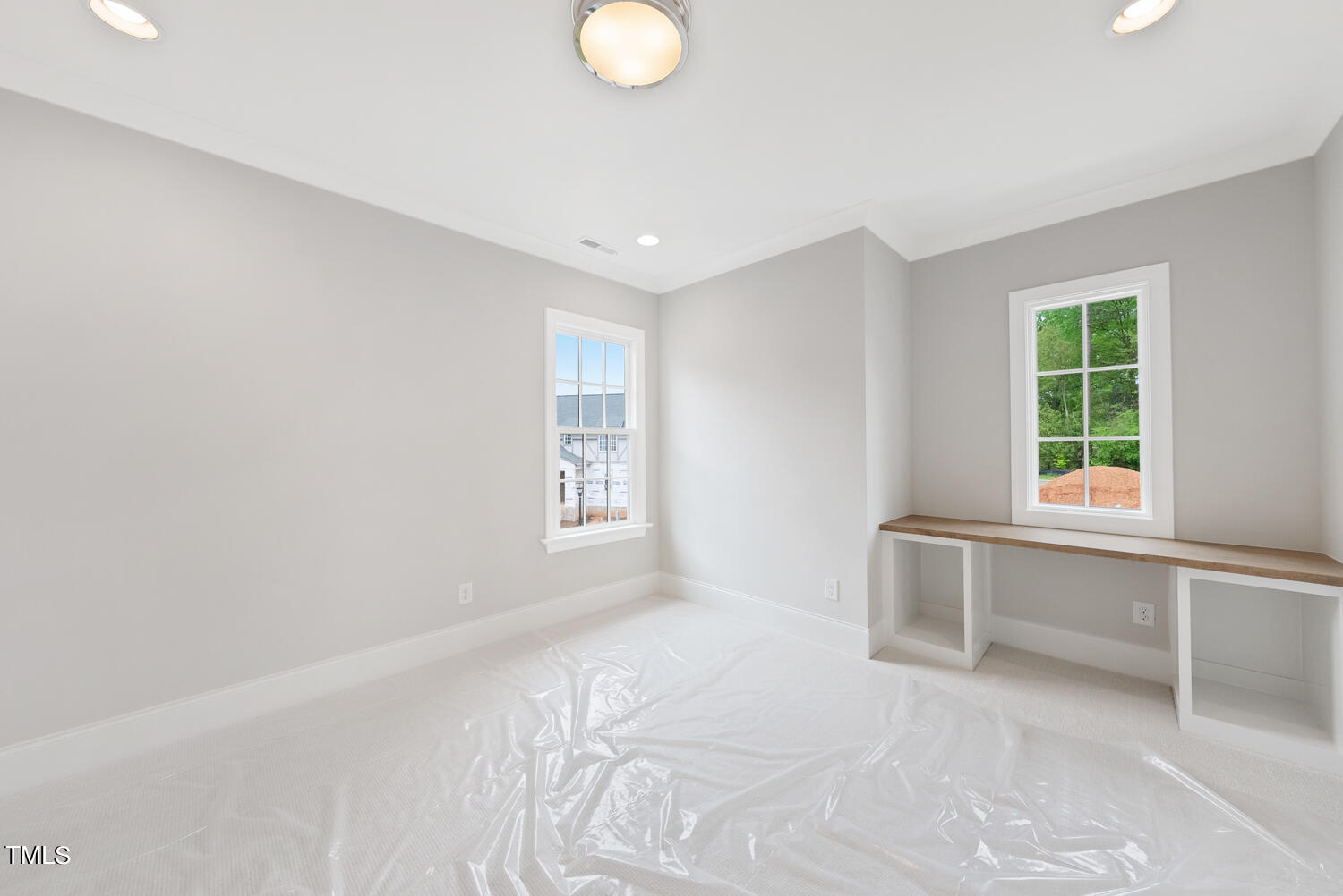 2639 Marchmont Street Raleigh, NC 27608 - Photo 27 of 41 a view of an empty room with a window