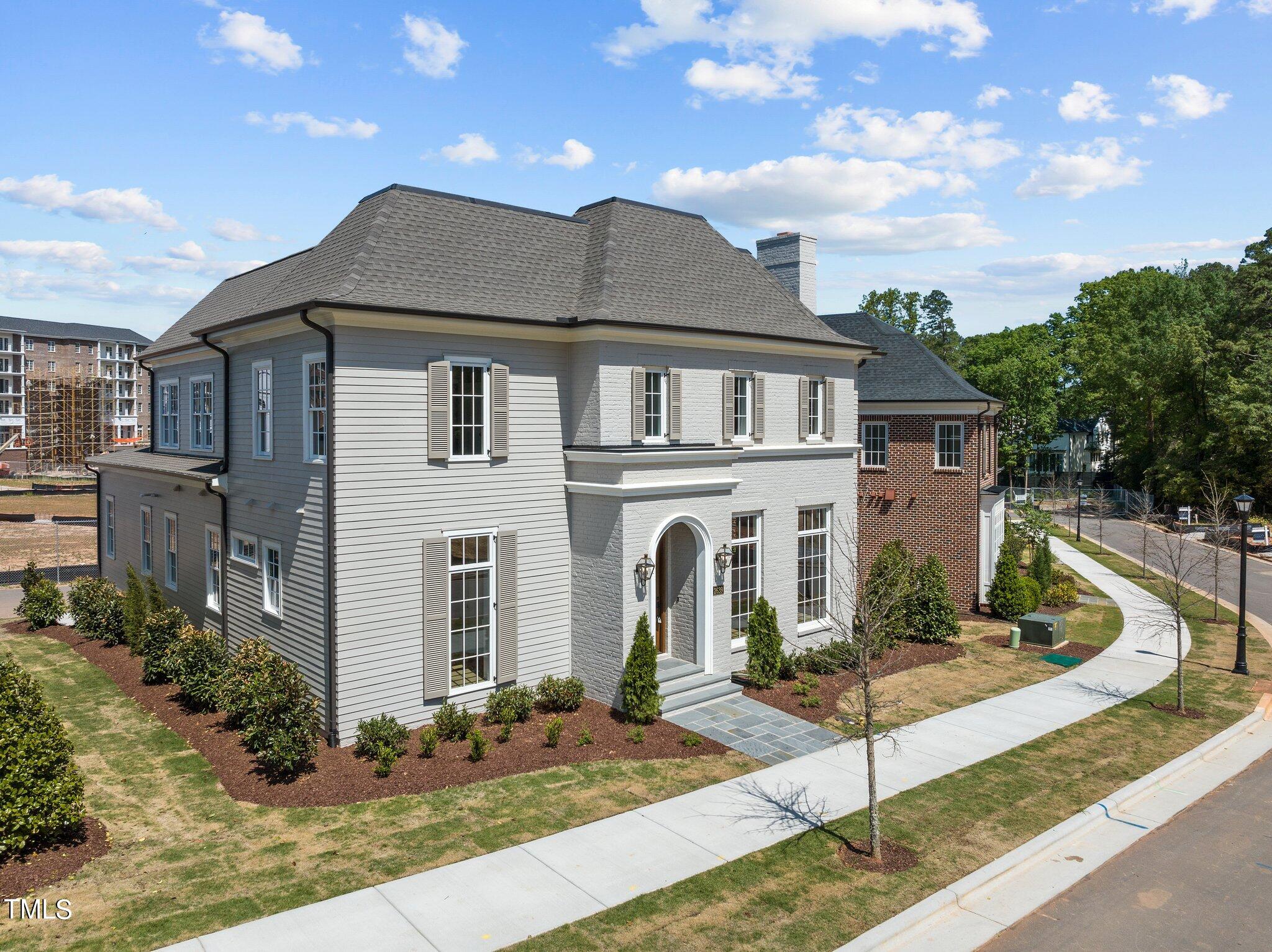 2639 Marchmont Street Raleigh, NC 27608 - Photo 3 of 41 a front view of a house with garden