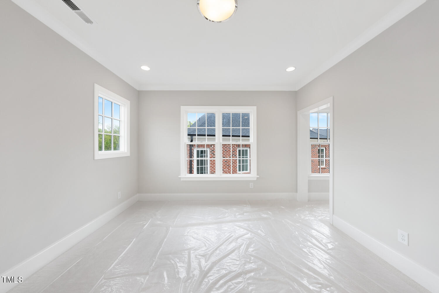 2639 Marchmont Street Raleigh, NC 27608 - Photo 32 of 41 a view of an empty room with a window
