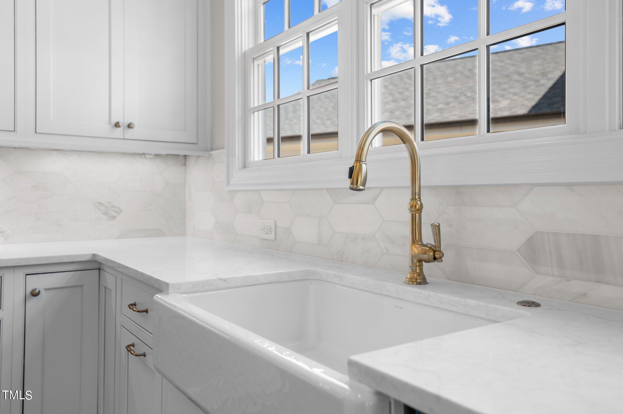 2639 Marchmont Street Raleigh, NC 27608 - Photo 7 of 41 a close view of a sink and tap