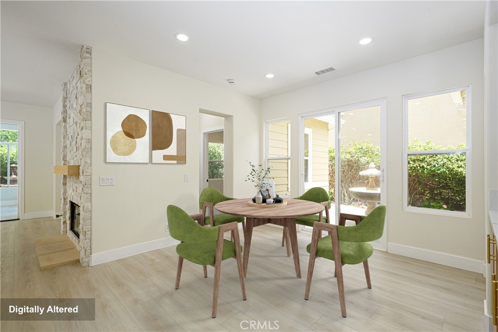 15 Plum Street Ladera Ranch, CA 92694 - Photo 33 of 113 a view of a dining room with furniture window and wooden floor