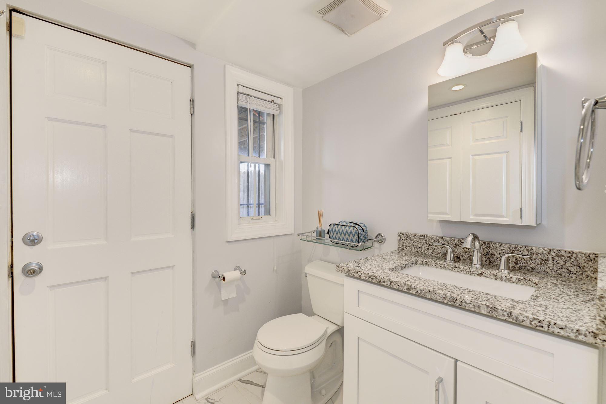 1631 D Street Northeast Washington, DC 20002 - Photo 14 of 27 Lower Level Full Bath/Laundry Room