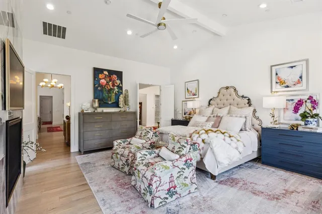 a bedroom with bed and furniture