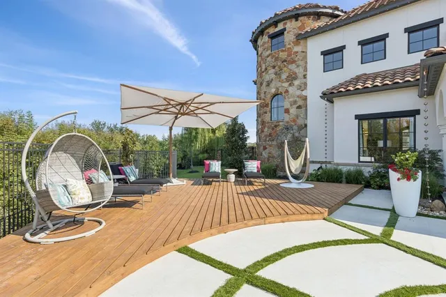 a view of a swimming pool with a patio