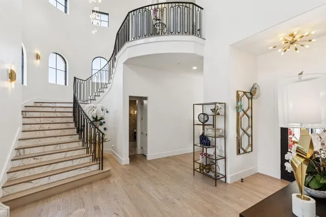 a view of entryway with workspace and stairs