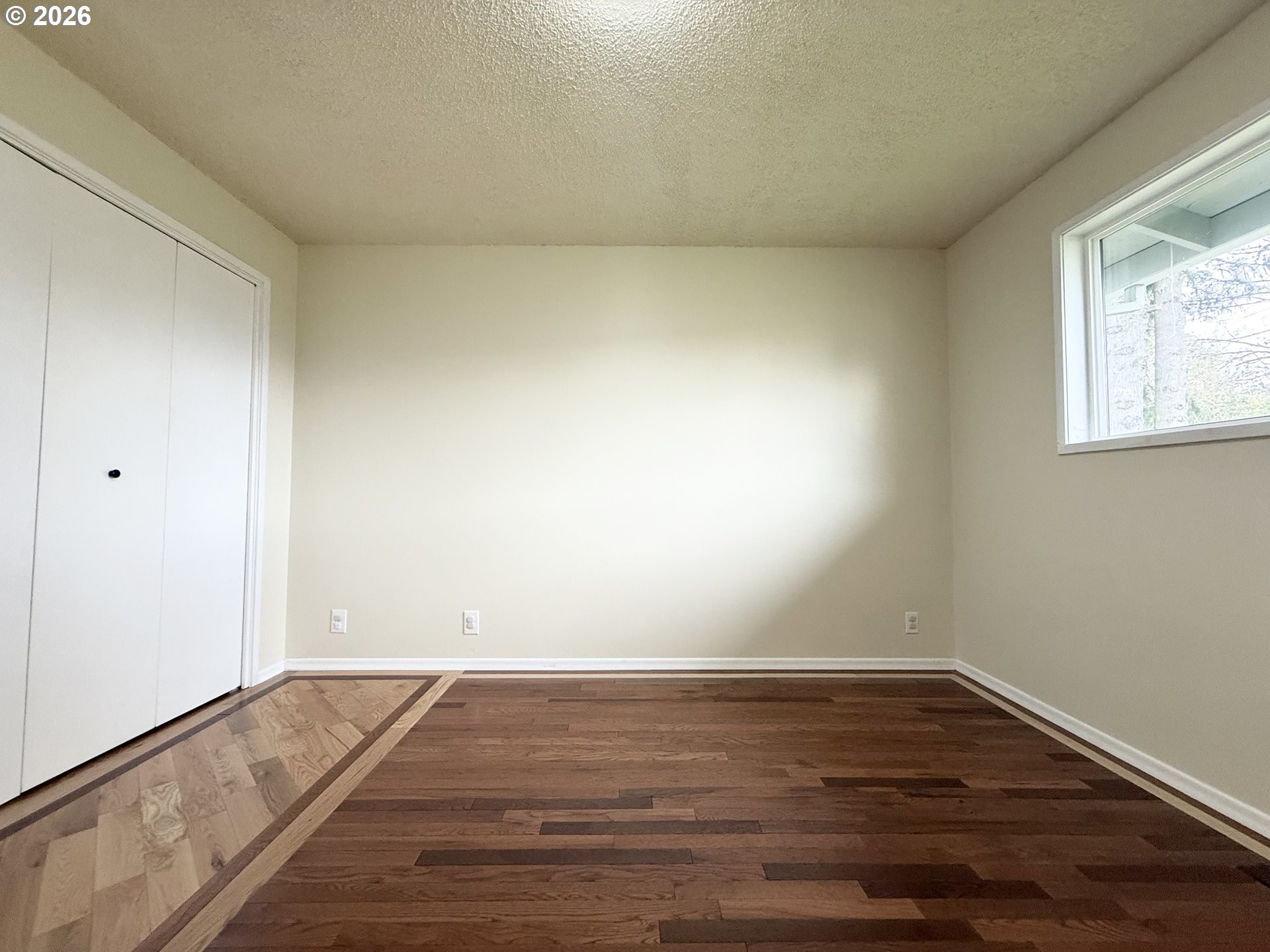 5270 Southwest 182nd Avenue Beaverton, OR 97078 - Photo 19 of 35 a view of room with wooden floor and window