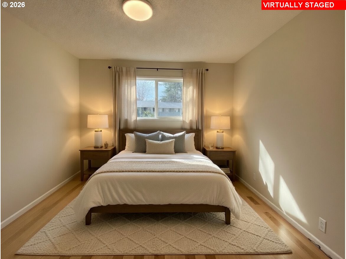 5270 Southwest 182nd Avenue Beaverton, OR 97078 - Photo 28 of 35 a bedroom with a bed and window
