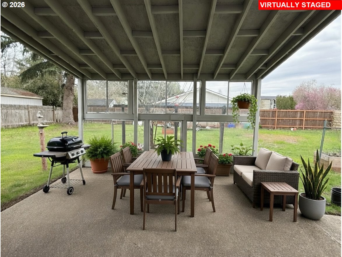 5270 Southwest 182nd Avenue Beaverton, OR 97078 - Photo 31 of 35 a view of an outdoor dining space with furniture and garden