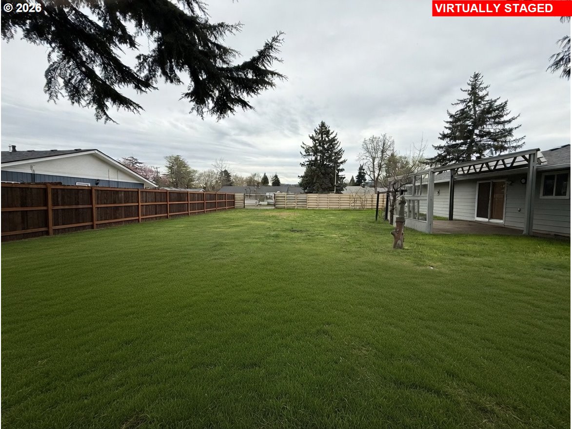 5270 Southwest 182nd Avenue Beaverton, OR 97078 - Photo 34 of 35 a view of a house with a backyard