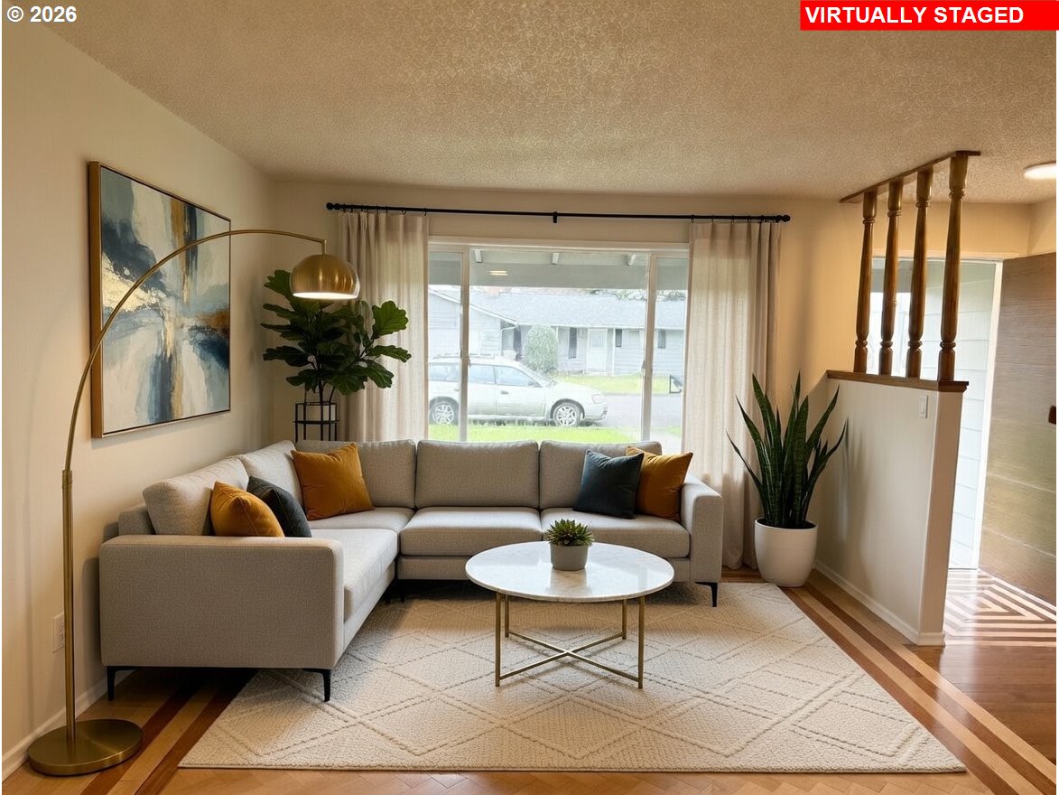 5270 Southwest 182nd Avenue Beaverton, OR 97078 - Photo 9 of 35 a living room with furniture and a potted plant