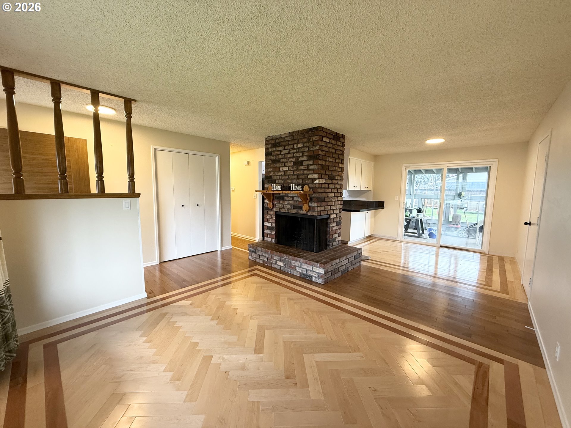 5270 Southwest 182nd Avenue Beaverton, OR 97078 - Photo 10 of 35 a living room with furniture and a fireplace