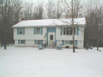 810 Mountain Road Albrightsville, PA 18210 - Photo 1 of 1 front view of house with a yard
