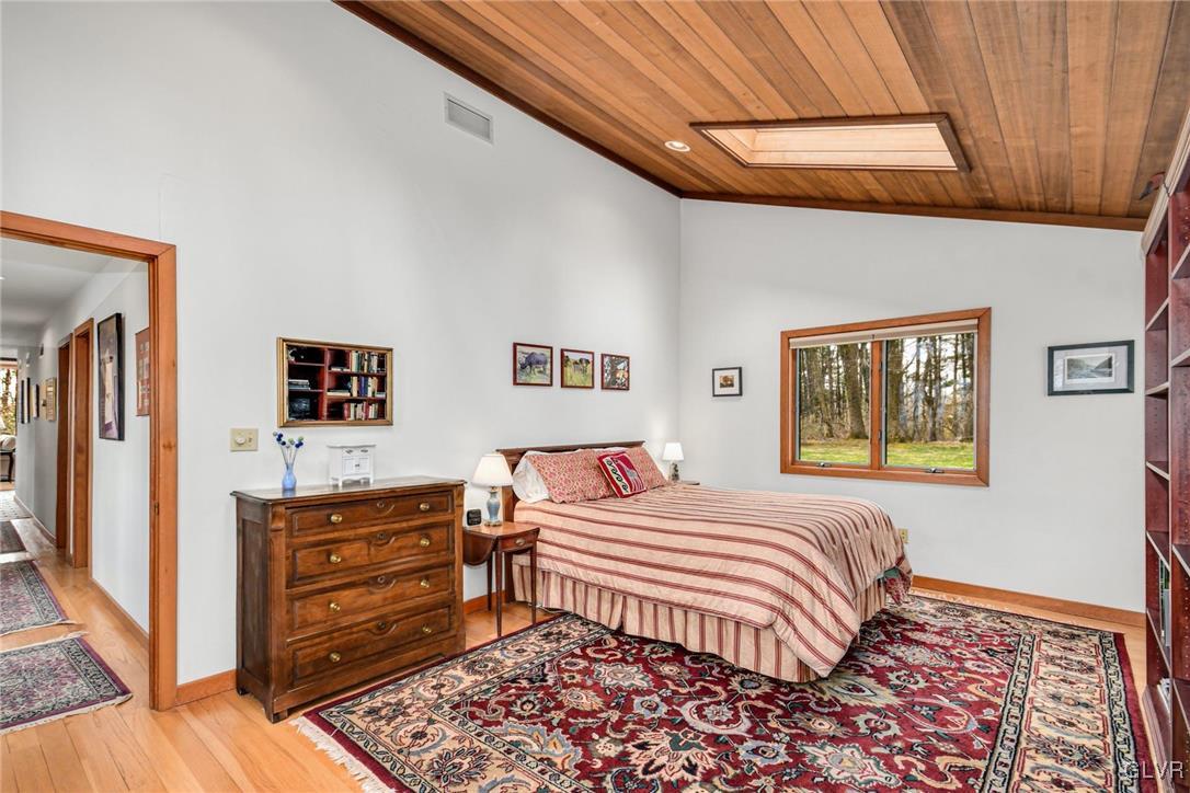290 Steely Hill Road Riegelsville, PA 18077 - Photo 15 of 33 a bedroom with a bed and a dresser