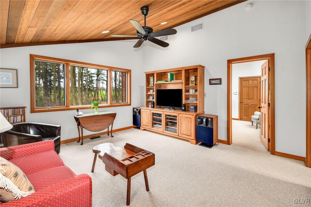 290 Steely Hill Road Riegelsville, PA 18077 - Photo 20 of 33 a living room with furniture and a flat screen tv