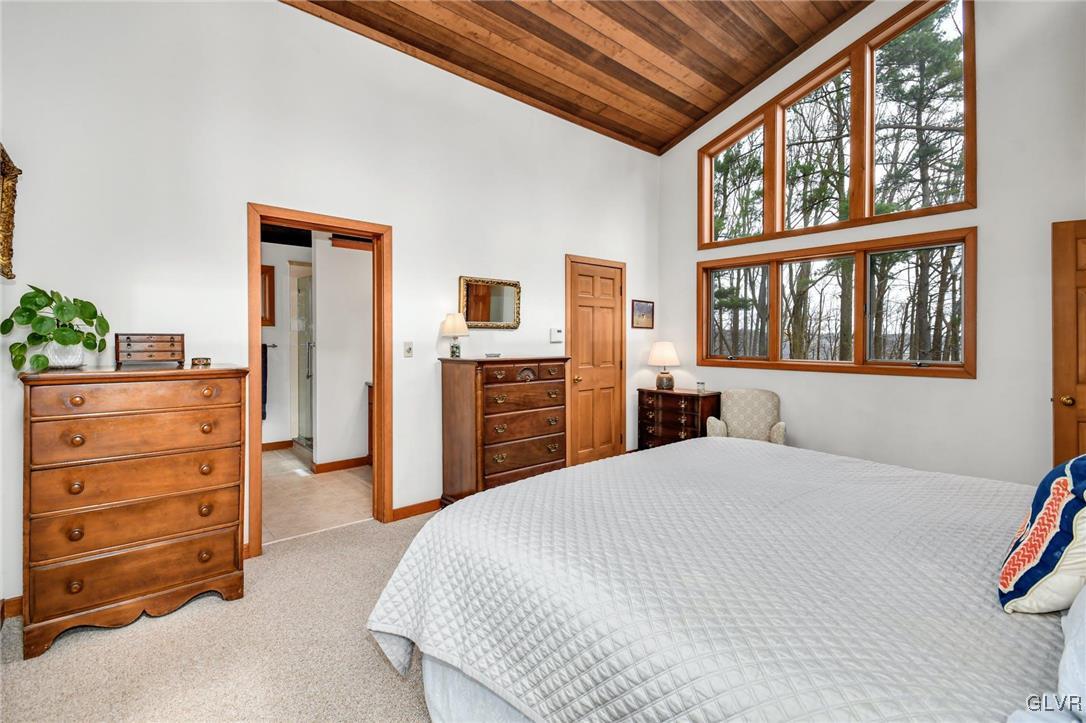290 Steely Hill Road Riegelsville, PA 18077 - Photo 21 of 33 a bedroom with a bed and a dresser